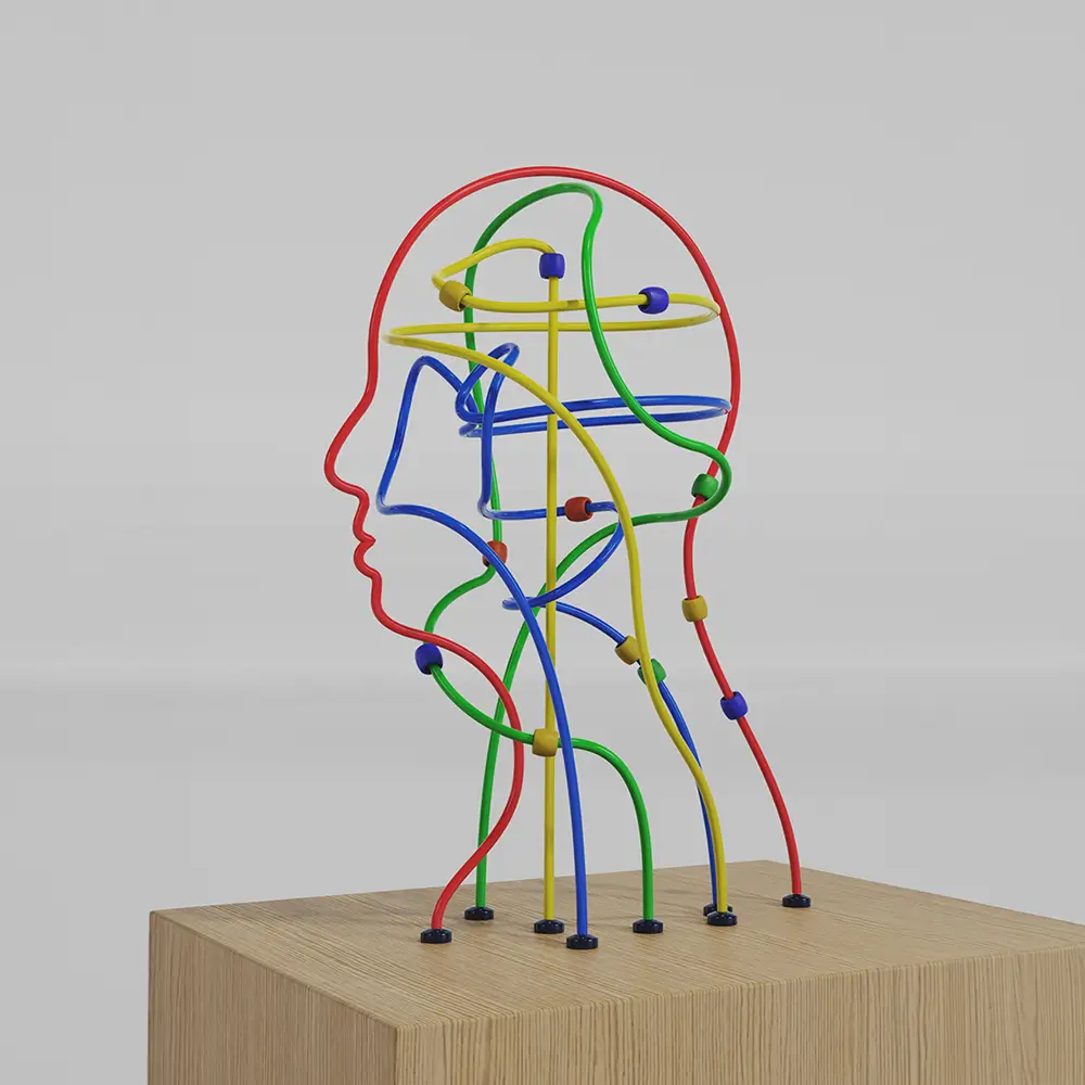 Sculpture de tête composée de fils multicolores